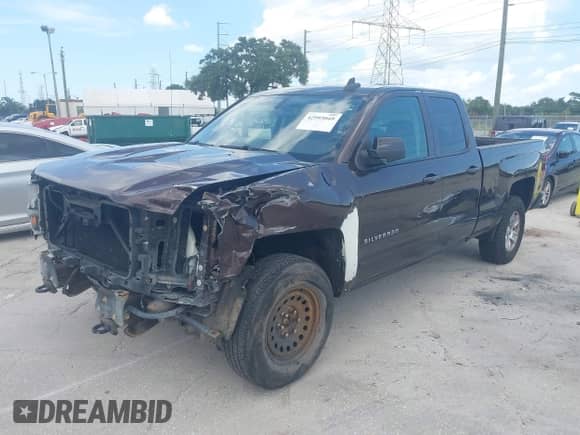 2016 Chevrolet Silverado 1500 LT z VIN 1GCVKREC6GZ221485, wystawiony jako IAAI lot #42993049 z przebiegiem 145 488 mil mil oraz . Historia ofert i sprzedaży dostępna na DreamBid. Obrazek 2.