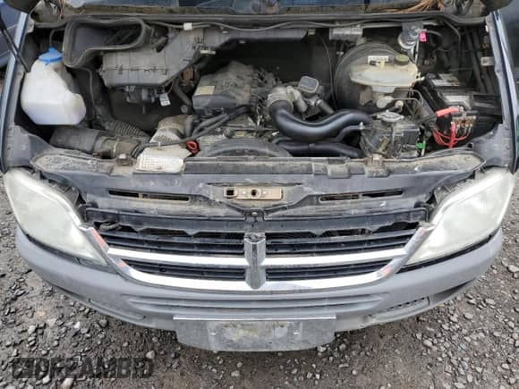 2004 Dodge Sprinter with VIN WD2PD144X45655232, listed as a Copart auction lot 50697675 with 212,674 mi miles and Salvage title. Bid and sale history available at DreamBid. Image 12.