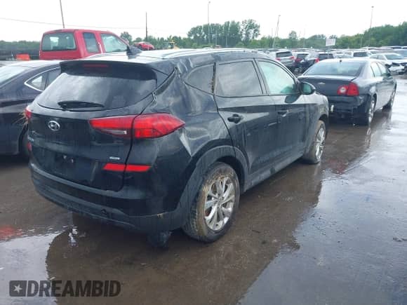 2021 Hyundai Tucson Value with VIN KM8J3CA4XMU359347, listed as a IAAI auction lot 42534595 with 48,704 mi miles and . Bid and sale history available at DreamBid. Image 4.