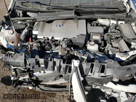 2018 Toyota Prius Plus z VIN JTDKARFP0J3079152, wystawiony jako Copart lot #80650285 z przebiegiem 77 519 mil mil oraz Szkoda całkowita • Salvage title. Historia ofert i sprzedaży dostępna na DreamBid. Obrazek 11.