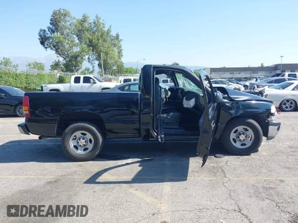 2000 Chevrolet Silverado 1500 LS with VIN 1GCEC14W7YZ147831, listed as a IAAI auction lot 42386307 with Not provided miles and . Bid and sale history available at DreamBid. Image 13.