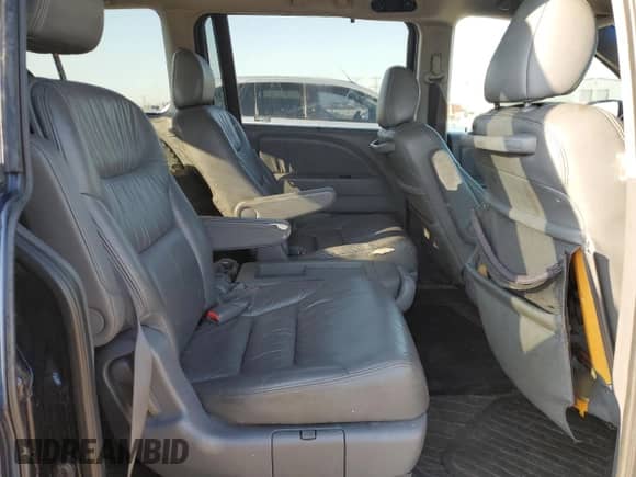 2007 Honda Odyssey EX-L с VIN 5FNRL38707B077318, выставлен на аукционе Copart как лот 71250165 с пробегом 174 272 миль миль и Списание • Salvage title. История ставок и продаж доступна на DreamBid. Изображение 11.
