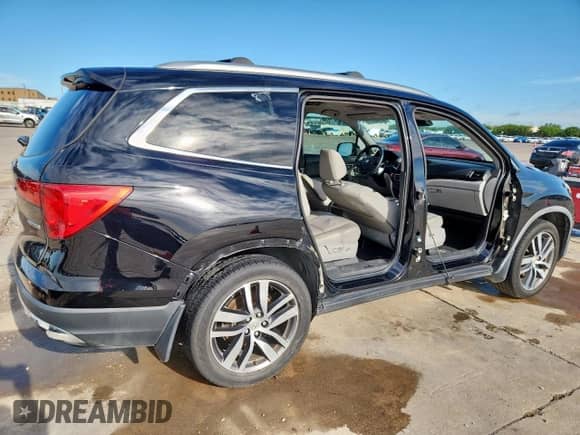 2016 Honda Pilot Touring с VIN 5FNYF5H99GB025718, выставлен на аукционе Copart как лот 60103315 с пробегом 204 940 миль миль и Чистый • Clean title. История ставок и продаж доступна на DreamBid. Изображение 3.