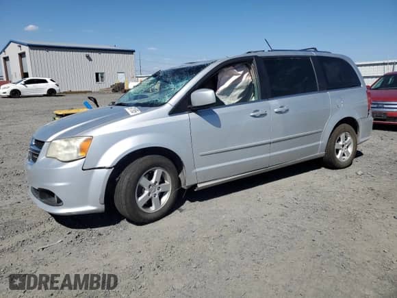 2011 Dodge Grand Caravan Crew with VIN 2D4RN5DGXBR752491, listed as a Copart auction lot 65971955 with 130,011 mi miles and Salvage title. Bid and sale history available at DreamBid. Image 1.