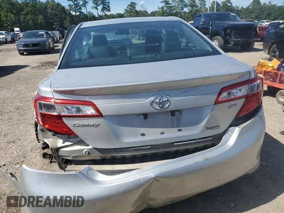 2014 Toyota Camry LE с VIN 4T1BF1FKXEU755951, выставлен на аукционе Copart как лот 64700355 с пробегом 162 254 миль миль и Списание • Salvage title. История ставок и продаж доступна на DreamBid. Изображение 6.