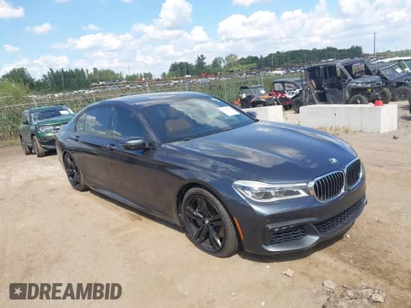 2016 BMW 7 Series 750i xDrive with VIN WBA7F2C51GG416492, listed as a IAAI auction lot 43127235 with 115,379 mi miles and . Bid and sale history available at DreamBid. Image 1.