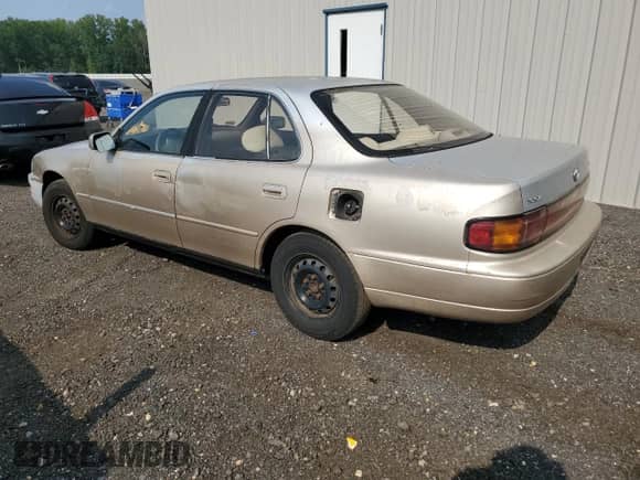 1994 Toyota Camry с VIN 41TSK12E6RU41676, выставлен на аукционе Copart как лот 59421825 с пробегом 106 264 миль миль и На запчасти • Non repairable. История ставок и продаж доступна на DreamBid. Изображение 2.