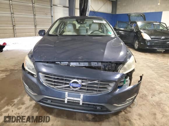 2015 Volvo S60 T5 Drive-E Premier with VIN YV126MFK9F1354636, listed as a Copart auction lot 61228855 with 143,125 mi miles and Salvage title. Bid and sale history available at DreamBid. Image 5.