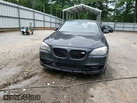2013 BMW 7 Series 750i xDrive with VIN WBAYB6C57DD223543, listed as a Copart auction lot 59290365 with 116,576 mi miles and Salvage title. Bid and sale history available at DreamBid. Image 13.