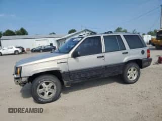 1994 Jeep Grand Cherokee Limited с VIN 1J4GZ78S1RC206288, выставлен на аукционе Copart как лот 62392685 с пробегом 207 731 миль миль и Списание • Salvage title. История ставок и продаж доступна на DreamBid. Изображение 1.