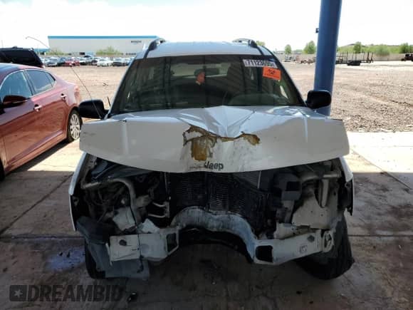 2003 Jeep Grand Cherokee Laredo z VIN 1J4GX48S53C518626, wystawiony jako Copart lot #71123695 z przebiegiem 196 154 mil mil oraz Szkoda całkowita • Salvage title. Historia ofert i sprzedaży dostępna na DreamBid. Obrazek 5.