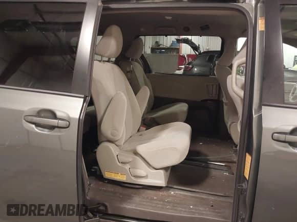 2013 Toyota Sienna LE AAS z VIN 5TDKK3DC4DS382349, wystawiony jako IAAI lot #43329574 z przebiegiem 143 911 mil mil oraz . Historia ofert i sprzedaży dostępna na DreamBid. Obrazek 8.