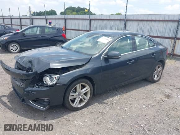 2015 Volvo S60 T5 Drive-E Premier with VIN YV140MFK4F2337702, listed as a IAAI auction lot 42771004 with 129,348 mi miles and . Bid and sale history available at DreamBid. Image 2.