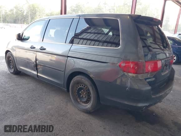 2010 Honda Odyssey LX with VIN 5FNRL3H22AB046762, listed as a IAAI auction lot 42848890 with 222,984 mi miles and . Bid and sale history available at DreamBid. Image 3.