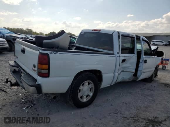 2005 GMC Sierra 1500 SLT z VIN 2GTEC13T751389983, wystawiony jako Copart lot #68369934 z przebiegiem Nie podano mil oraz Szkoda całkowita • Salvage title. Historia ofert i sprzedaży dostępna na DreamBid. Obrazek 3.