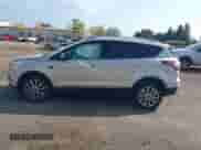 2017 Ford Escape Titanium with VIN 1FMCU0JD7HUE92688, listed as a IAAI auction lot 43171142 with 156,576 mi miles and . Bid and sale history available at DreamBid. Image 14.