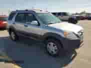 2002 Honda CR-V EX with VIN JHLRD78852C036088, listed as a Copart auction lot 70121155 with 166,996 mi miles and Salvage title. Bid and sale history available at DreamBid. Image 4.