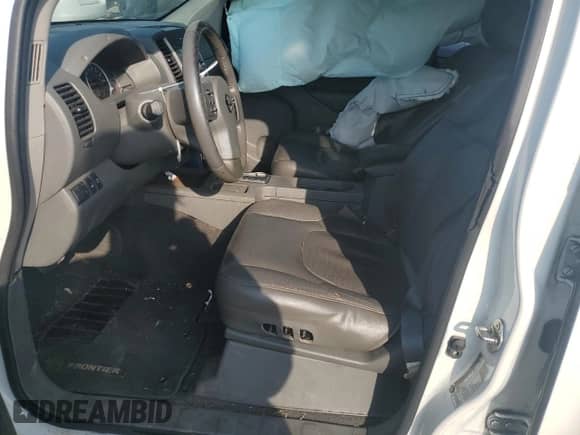 2019 Nissan Frontier SL with VIN 1N6AD0EVXKN771419, listed as a Copart auction lot 69157914 with 111,635 mi miles and Salvage title. Bid and sale history available at DreamBid. Image 7.