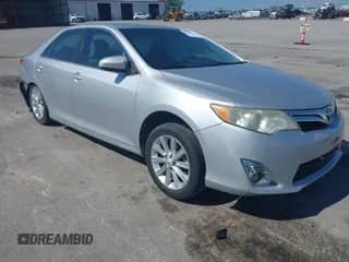 2012 Toyota Camry SE with VIN 4T1BK1FK0CU506194, listed as a IAAI auction lot 42582437 with 120,895 mi miles and . Bid and sale history available at DreamBid. Image 1.
