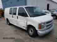 1999 Chevrolet Express Cargo with VIN 1GCEG15M6X1073753, listed as a Copart auction lot 58412213 with 50,764 mi miles and Salvage title. Bid and sale history available at DreamBid. Image 4.