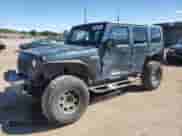 2007 Jeep Wrangler Unlimited Sahara z VIN 1J4GA59127L101693, wystawiony jako Copart lot #84449745 z przebiegiem 226 790 mil mil oraz Szkoda całkowita • Salvage title. Historia ofert i sprzedaży dostępna na DreamBid. Obrazek 1.