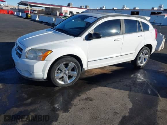 2011 Dodge Caliber Rush with VIN 1B3CB8HB7BD298264, listed as a IAAI auction lot 41402019 with 124,250 mi miles and . Bid and sale history available at DreamBid. Image 2.