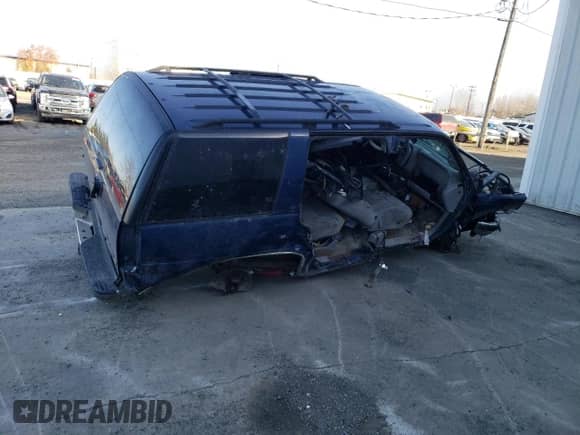 1999 Chevrolet Tahoe Z71 z VIN 1GNEK13R5XJ525230, wystawiony jako Copart lot #76624504 z przebiegiem 204 489 mil mil oraz Szkoda całkowita • Salvage title. Historia ofert i sprzedaży dostępna na DreamBid. Obrazek 3.