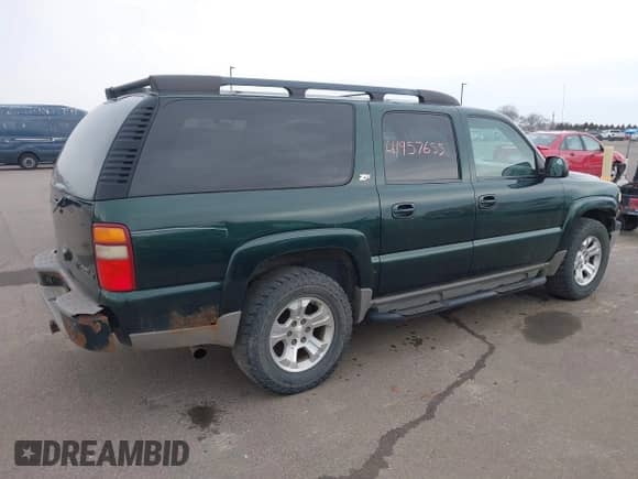 2001 Chevrolet Suburban LT with VIN 3GNFK16T71G245894, listed as a IAAI auction lot 41957655 with Not provided miles and . Bid and sale history available at DreamBid. Image 4.