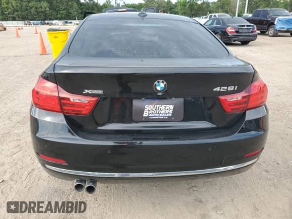 2015 BMW 4 Series 428i xDrive z VIN WBA4A7C54FD413570, wystawiony jako Copart lot #62432505 z przebiegiem 98 017 mil mil oraz Szkoda całkowita • Salvage title. Historia ofert i sprzedaży dostępna na DreamBid. Obrazek 6.