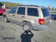 2000 Jeep Grand Cherokee Laredo z VIN 1J4GW48S0YC309210, wystawiony jako IAAI lot #43551821 z przebiegiem 324 070 mil mil oraz . Historia ofert i sprzedaży dostępna na DreamBid. Obrazek 3.