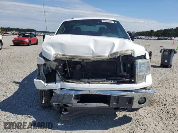 2013 Ford F-150 XLT с VIN 1FTFW1ET8DFA50018, выставлен на аукционе Copart как лот 80842835 с пробегом 241 595 миль миль и Списание • Salvage title. История ставок и продаж доступна на DreamBid. Изображение 5.