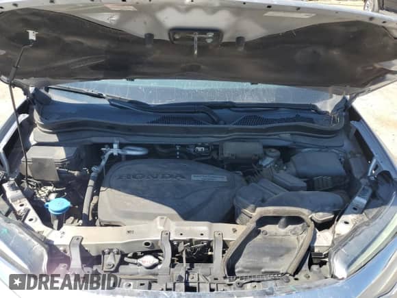 2019 Honda Pilot Touring 8-Passenger z VIN 5FNYF5H98KB007882, wystawiony jako Copart lot #65011685 z przebiegiem 145 649 mil mil oraz Szkoda całkowita • Salvage title. Historia ofert i sprzedaży dostępna na DreamBid. Obrazek 12.