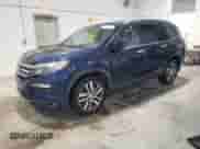 2016 Honda Pilot Elite z VIN 5FNYF6H04GB061761, wystawiony jako Copart lot #90471545 z przebiegiem 130 829 mil mil oraz Czysty tytuł • Clean title. Historia ofert i sprzedaży dostępna na DreamBid. Obrazek 1.