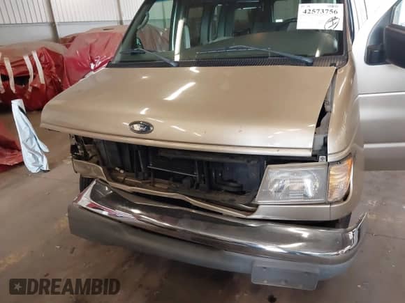 1999 Ford Econoline Cargo with VIN 1FDRE14W5XHA87026, listed as a IAAI auction lot 42573756 with 93,360 mi miles and . Bid and sale history available at DreamBid. Image 6.