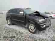 2018 Jeep Grand Cherokee Laredo E with VIN 1C4RJEAG1JC451192, listed as a Copart auction lot 65430435 with 177,827 mi miles and Salvage title. Bid and sale history available at DreamBid. Image 4.