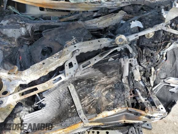 2021 Chevrolet Traverse Premier с VIN 1GNEVKKW2MJ138490, выставлен на аукционе Copart как лот 55822675 с пробегом Не указан миль и Списание • Salvage title. История ставок и продаж доступна на DreamBid. Изображение 12.