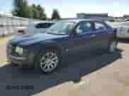 2005 Chrysler 300 C with VIN 2C3JA63H85H679092, listed as a Copart auction lot 70284705 with 191,335 mi miles and Salvage title. Bid and sale history available at DreamBid. Image 1.