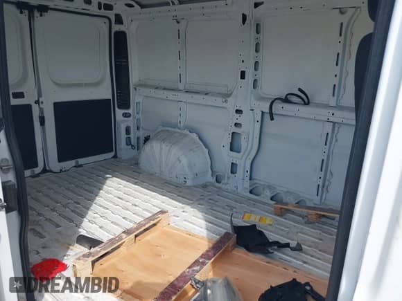 2023 Ram ProMaster Cargo z VIN 3C6LRVVG1PE606308, wystawiony jako IAAI lot #42824322 z przebiegiem 60 497 mil mil oraz . Historia ofert i sprzedaży dostępna na DreamBid. Obrazek 8.