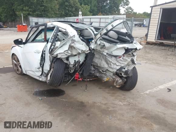 2013 Hyundai Veloster w/Black Int z VIN KMHTC6AD0DU155604, wystawiony jako IAAI lot #43314820 z przebiegiem 141 866 mil mil oraz . Historia ofert i sprzedaży dostępna na DreamBid. Obrazek 3.