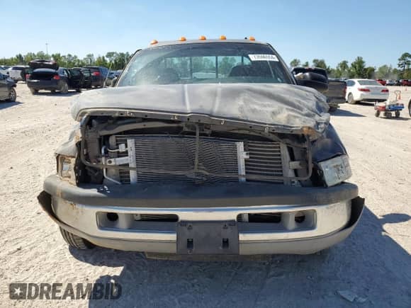 2002 Dodge 2500 z VIN 3B7KC23C52M271394, wystawiony jako Copart lot #73596554 z przebiegiem Nie podano mil oraz Szkoda całkowita • Salvage title. Historia ofert i sprzedaży dostępna na DreamBid. Obrazek 5.