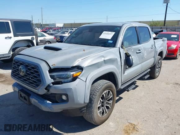 2021 Toyota Tacoma SR5 z VIN 5TFAZ5CN4MX097831, wystawiony jako IAAI lot #43320227 z przebiegiem 31 588 mil mil oraz . Historia ofert i sprzedaży dostępna na DreamBid. Obrazek 17.