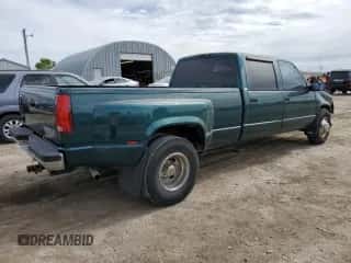 1997 Chevrolet Silverado 3500 z VIN 1GCHC33J1VF013991, wystawiony jako Copart lot #56521345 z przebiegiem 151 189 mil mil oraz Szkoda całkowita • Salvage title. Historia ofert i sprzedaży dostępna na DreamBid. Obrazek 3.