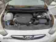 2014 Hyundai Accent GLS z VIN KMHCT4AE8EU656349, wystawiony jako Copart lot #89440825 z przebiegiem 150 288 mil mil oraz Czysty tytuł • Clean title. Historia ofert i sprzedaży dostępna na DreamBid. Obrazek 11.