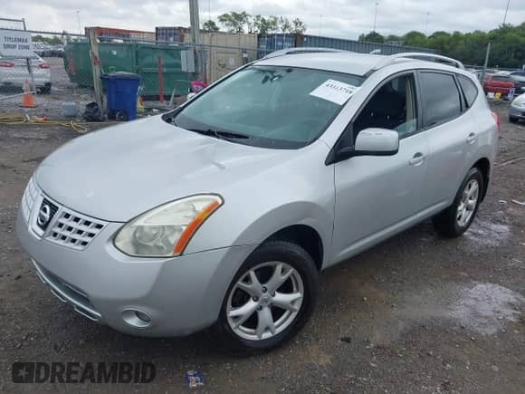 2009 Nissan Rogue SL with VIN JN8AS58T59W320889, listed as a IAAI auction lot 43313718 with 189,797 mi miles and . Bid and sale history available at DreamBid. Image 6.