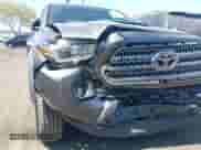 2016 Toyota Tacoma SR5 with VIN 3TMAZ5CNXGM009360, listed as a IAAI auction lot 43186084 with 89,490 mi miles and . Bid and sale history available at DreamBid. Image 6.