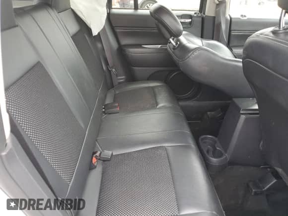 2016 Jeep Compass Latitude with VIN 1C4NJCEBXGD651394, listed as a Copart auction lot 54267375 with 110,113 mi miles and Salvage title. Bid and sale history available at DreamBid. Image 11.