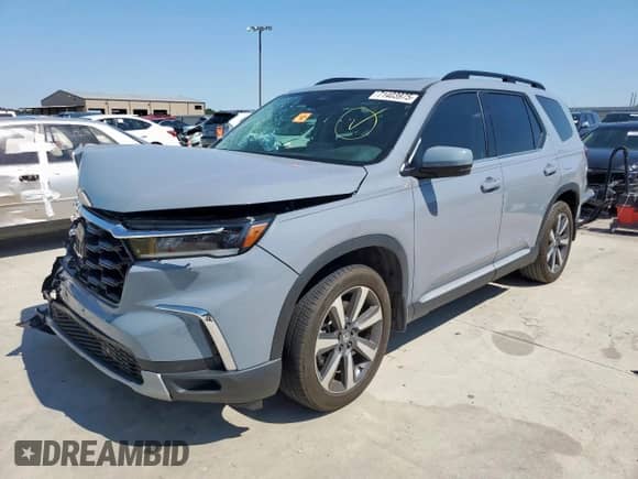 2024 Honda Pilot Touring with VIN 5FNYG1H74RB042109, listed as a Copart auction lot 71403975 with 19,671 mi miles and Salvage title. Bid and sale history available at DreamBid. Image 2.