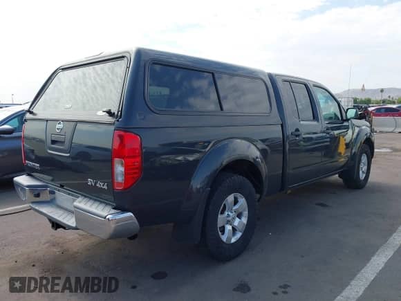 2012 Nissan Frontier SV with VIN 1N6AD0FV8CC466481, listed as a IAAI auction lot 42712478 with 101,691 mi miles and . Bid and sale history available at DreamBid. Image 4.