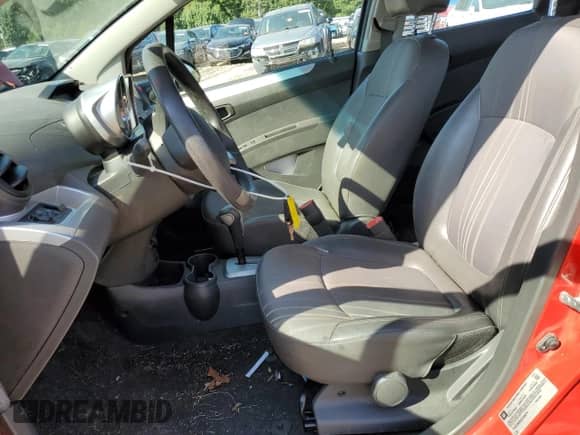 2014 Chevrolet Spark LT with VIN KL8CD6S92EC568376, listed as a Copart auction lot 81984665 with 67,765 mi miles and Salvage title. Bid and sale history available at DreamBid. Image 7.