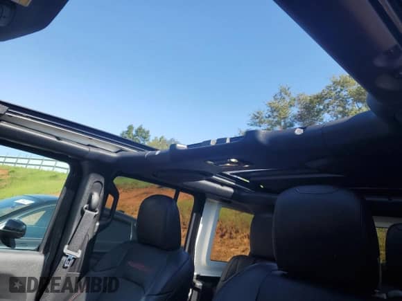 2023 Jeep Wrangler Rubicon с VIN 1C4HJXFN3PW618061, выставлен на аукционе Copart как лот 71963815 с пробегом 25 881 миль миль и Списание • Salvage title. История ставок и продаж доступна на DreamBid. Изображение 12.